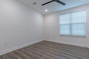 Santa Rosa Beach apartment for rent - A room with a window and a ceiling fan.
