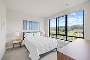Woodbridge apartment for rent - a bedroom with a bed and a large window at Rivergate, Virginia