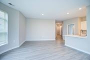 Glen Allen apartment for rent - A spacious room with a window on the left and a door on the right.