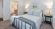 Chesterfield apartment for rent - a bedroom with a bed and two night stands at Livingston Flats Apartments, Chesterfield, Virginia