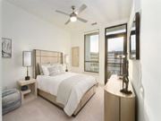 Richmond apartment for rent - a bedroom with a bed and a ceiling fan at Tapestry West, Virginia
