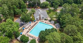 Richmond apartment for rent - an aerial view of a house with a swimming pool at Trails at Short Pump Apartments, Richmond, VA