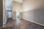 Aiken apartment for rent - A room with wooden floors and a white door.