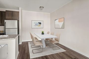 Midlothian apartment for rent - A dining room with a white table and chairs.