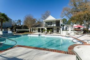 Macon apartment for rent - A swimming pool in front of a house.