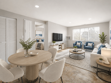 Columbus apartment for rent - A modern living room with a round table and chairs.