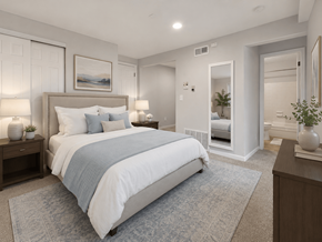 Bexley apartment for rent - A bedroom with a large bed and a painting on the wall.
