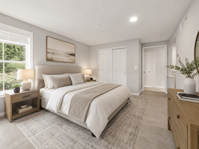 Bexley apartment for rent - A bedroom with a large bed, a nightstand with a lamp, and a painting on the wall.