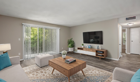 Shreveport apartment for rent - a living room with a couch and a coffee table