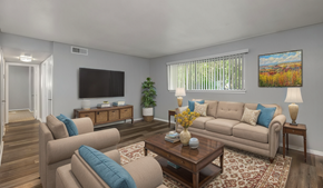 Shreveport apartment for rent - a living room with couches and chairs and a television