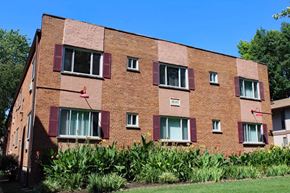 St. Louis apartment for rent - a large brick building with lots of windows