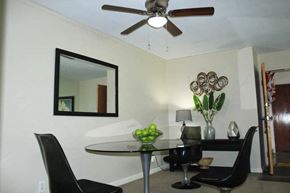 St. Louis apartment for rent - a dining room with a table and chairs