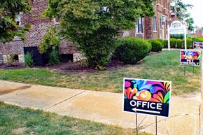 St. Louis apartment for rent - A sign that says "OFFICE" is in front of a building.