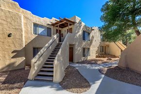 Barstow apartment for rent - A modern house with a staircase leading to the entrance.