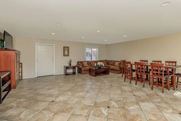 Indio apartment for rent - a living room and dining room with a table and chairs