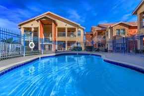 Hesperia apartment for rent - a large swimming pool in front of a house