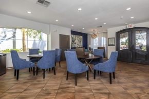 Las Vegas apartment for rent - a dining room with blue chairs and a table