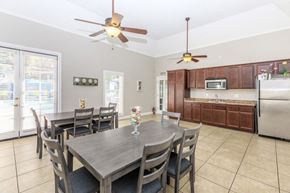 Riverside apartment for rent - a dining room with a table and chairs
