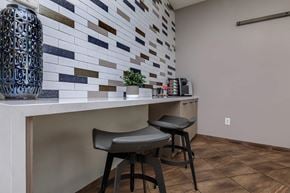 Las Vegas apartment for rent - two stools at a counter in a kitchen with a tile wall