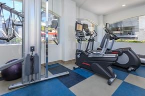 Las Vegas apartment for rent - a gym with exercise equipment and a window