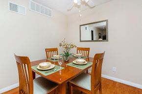 Indio apartment for rent - a dining room with a table and chairs