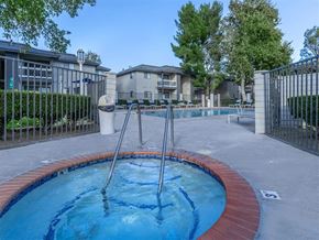 Lancaster apartment for rent - A small pool with a red border and a diving board.