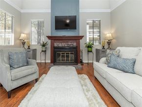 Lancaster apartment for rent - A living room with a fireplace and a television.