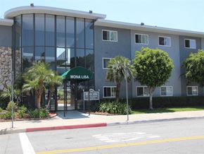 Pico Rivera apartment for rent - The Mona Lisa apartments are located in a modern building with a glass facade.