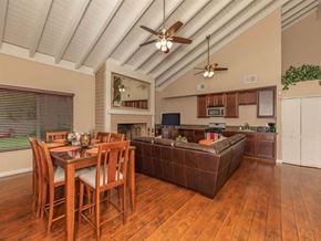 Santa Ana apartment for rent - A dining room with a wooden table and chairs.