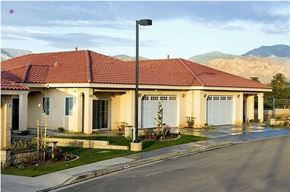 Redlands apartment for rent - A house with a red roof and a street light in front.