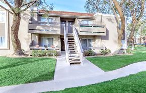 Barstow apartment for rent - A building with a staircase leading to the second floor.