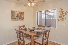 Victorville apartment for rent - A dining room with a table set for four.