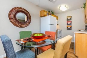 Mesa apartment for rent - a dining room table with a bowl of fruit on top of it