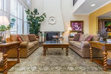 Mesa apartment for rent - a living room filled with furniture and a fireplace