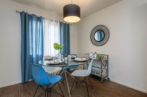 Phoenix apartment for rent - a dining room with a glass table and chairs