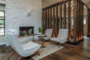 Phoenix apartment for rent - a living room with chairs and a fireplace