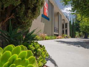 San Jose apartment for rent - 470 Building and Logo and Plants