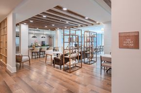 Indian Land apartment for rent - a dining room with wooden floors and tables and chairs