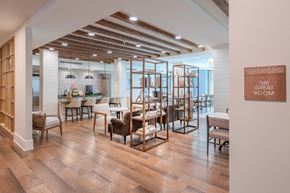 Matthews apartment for rent - a dining room with wooden floors and tables and chairs