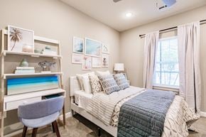 Cape Coral apartment for rent - a bedroom with a bed and a desk and a window at Vantage Luxury Apartments in Cape Coral, Fl