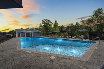 Sparkling pool with expansive sundeck