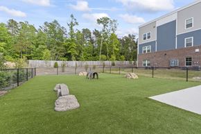 Charlotte apartment for rent - A playground with a slide and a rocking horse.