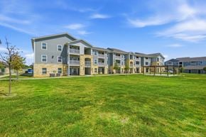 San Antonio apartment for rent - A large grassy area in front of apartment buildings.