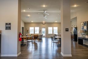 Whitestown apartment for rent - A well-lit dining room with a table set for six.