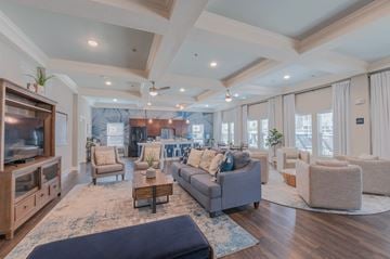 Grove City apartment for rent - a living room with couches and chairs and a television