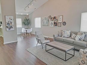 Frankfort apartment for rent - Clubhouse living room with a couch and a coffee table at Frankfort Place apartments in Frankfort, Indiana