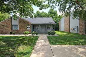 Tipton apartment for rent - Hazelton Apartments Clubhouse exterior with a sidewalk