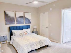 Beaumont apartment for rent - a bedroom with a bed and a closet