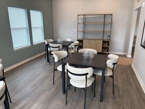Kansas City apartment for rent - A dining room with a table and chairs.