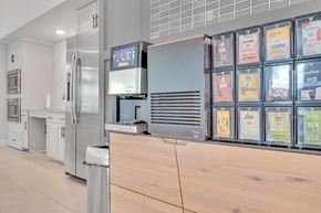 Charlotte apartment for rent - a kitchen with a coffee bar and a refrigerator at spire apartments